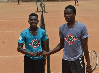 Tennis players show sportsmanship after a tough game