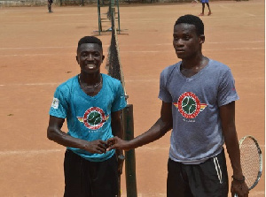 Tennis players show sportsmanship after a tough game