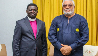 Charles Agyinasare (R) and former President Rawlings