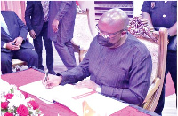 Vice President Mahamudu Bawumia signing the Book of Condolence