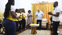 Former President Flt Lt Jerry John Rawlings in white, dancing to birthday tunes from the women