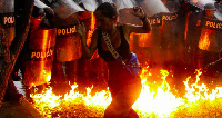 Protesters clash with police in Caracas after Venezuela's election result