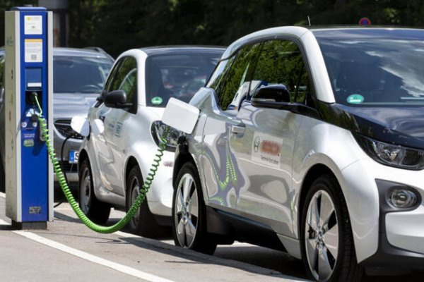 Electronic vehicle being charged