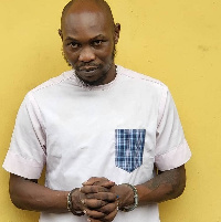 A mugshot of Seun Kuti