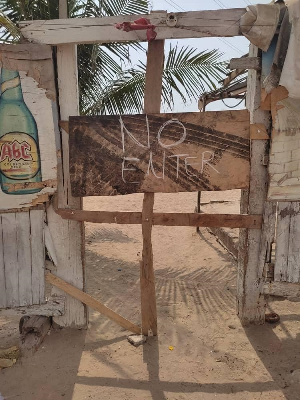 A 'No Entry' signage preventing usage of a beach in Tema