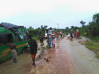 Some passengers on the side of the road