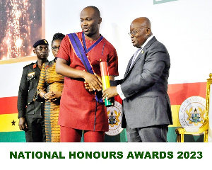 Richard Adjei, Managing Director Of Kasapreko Company Limited Receiving The Awards From President Na