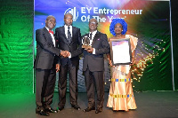 Dr Kwabena Adjei receives his award