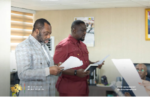 Energy Minister, Matthew Opoku-Prempeh swearing in Mr. Samuel Dubik Mahama