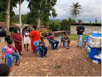 Dr Kojo Owusu-Koranteng talking to the Ayensukrom community on the coronavirus pandemic.