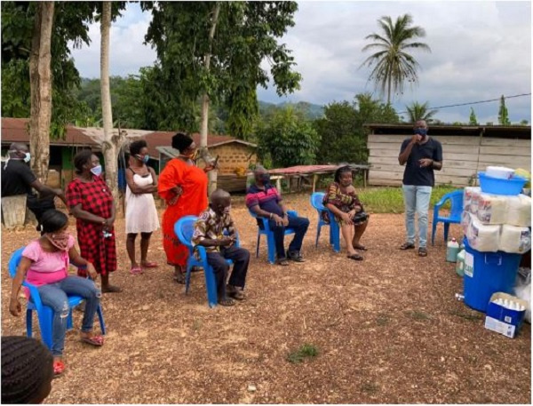 Dr Kojo Owusu-Koranteng talking to the Ayensukrom community on the coronavirus pandemic.