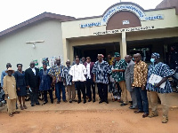 The commission members in a group photo