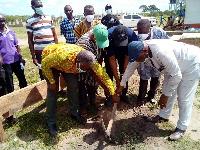 Mr Kwame Agbodzah, MP cutting a sod for the project to begin