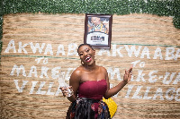 Lerny Lomotey displaying her plaque