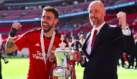 Manchester United manager Erik ten Hag celebrates the FA Cup win with captain Bruno Fernandes