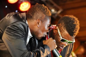 Asamoah Gyan with Castro on stage