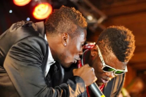 Asamoah Gyan with Castro on stage