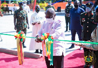 President Akufo-Addo cutting the ribbon for the opening of the apartment