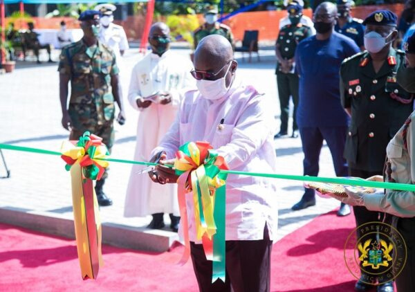 President Akufo-Addo cutting the ribbon for the opening of the apartment