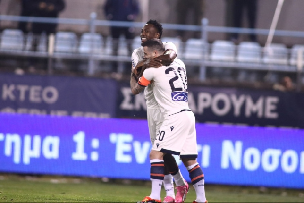 Baba Rahman celebrating goal with team mate