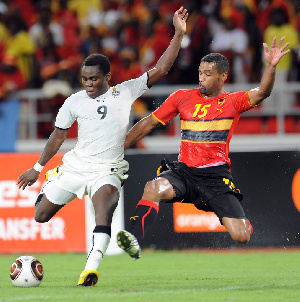 Opoku Agyemang [L] in action