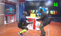 Akrobeto and referee Somo on the studio dance floor