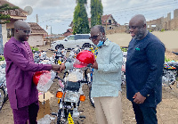 Godfred Yeboah Dame making the presentation to the party chairman