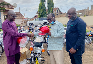 Godfred Yeboah Dame making the presentation to the party chairman