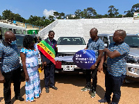 Acting Head of Agribusiness at Stanbic Bank, Benedict Obeng presenting the award