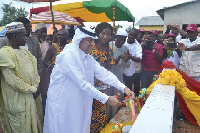 Mohammed Ahmed Alhumaidee cutting the tape to commence the construction