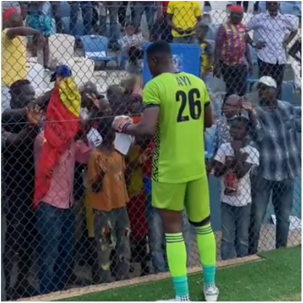 Goalkeeper Richmond Ayi apologizing to fans after the game