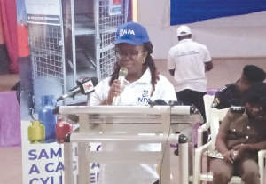 Linda Asante addressing the audience at a regional town hall durbar