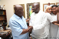 President Nana Addo Dankwa Akufo-Addo in a handshake with Vice President Bawumia