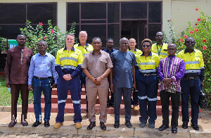 Mireku Duker with officials of Newmont Ghana