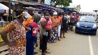 Some residents in a long queues