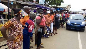 Some residents in a long queues