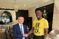 CEO of Kwarleyz Residence Nana Kwame Bediako [R] welcoming Jack Ma