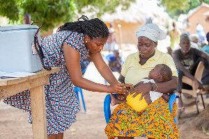 Dufe Dodzi Receives His Childhood Immunisation