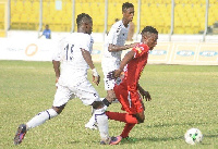 Former Hearts of Oak and Asante Kotoko winger Ollenu Ashitey in red