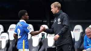 Brighton and Hove Albion defender, Tariq Lamptey and Graham Potter