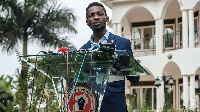 Robert Kyagulanyi, also known as Bobi Wine, speaks during a press conference.