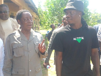 Stonebwoy and Dr. Kwabena Duffuor at the yet-to-be renovated school