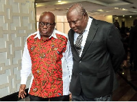 President Akufo-Addo (L) taking a walk with Martin Amidu (R)