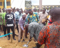 William Agyapong Quaittoo cutting sod for the construction of school projects in his constituency