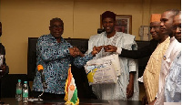 Peter Mac Manu captured in a photograph with some ministers of Niger