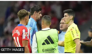 Real Madrid keeper Thibaut Courtois complained of objects being thrown on the field