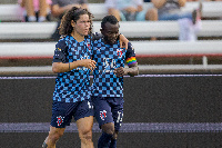 Solomon Asante with a teammate celebrating his goal