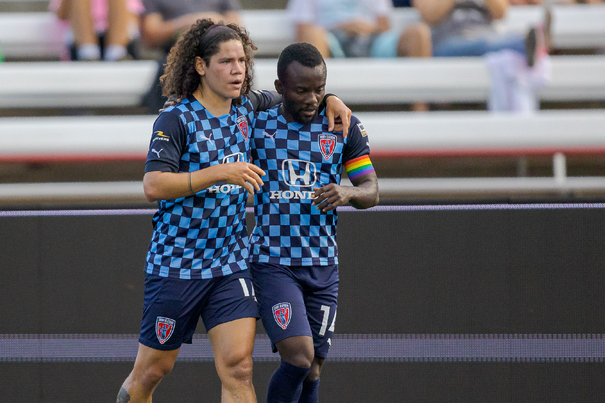 Solomon Asante with a teammate celebrating his goal