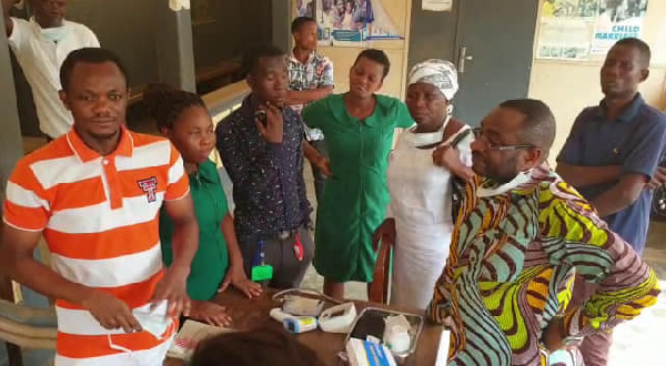 Hon. Woyome with some staff of Dabala health facility