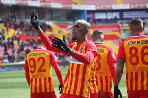 Bernard Mensah celebrating his goal